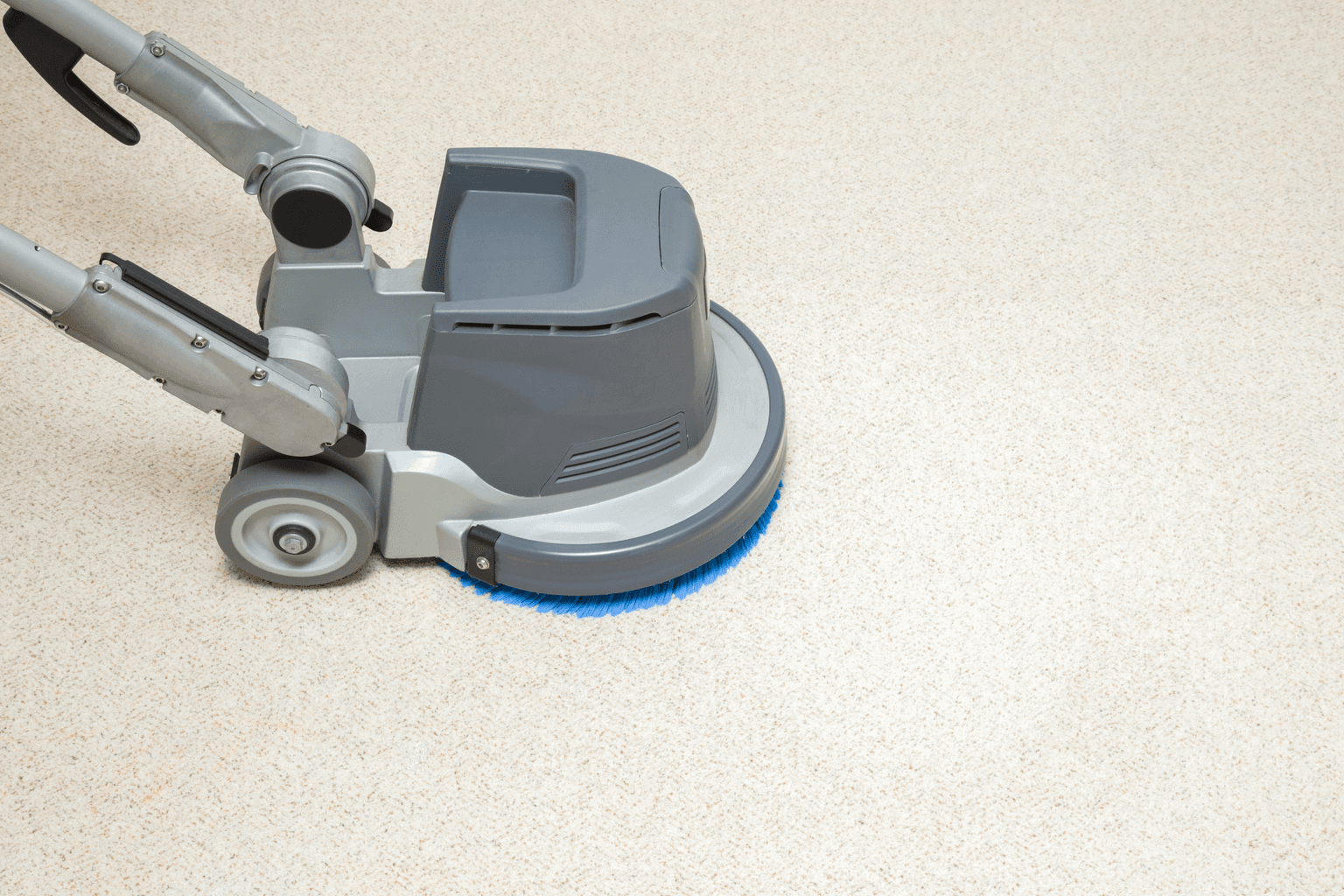 Safe-Dry cleaning machine leaving clean passes across gray carpet in a Cypress, TX home
